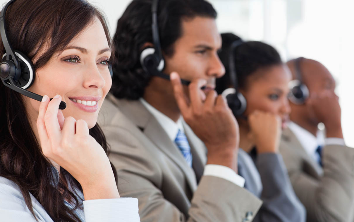 supply chain solutions customer service support team speaking with customers through headsets